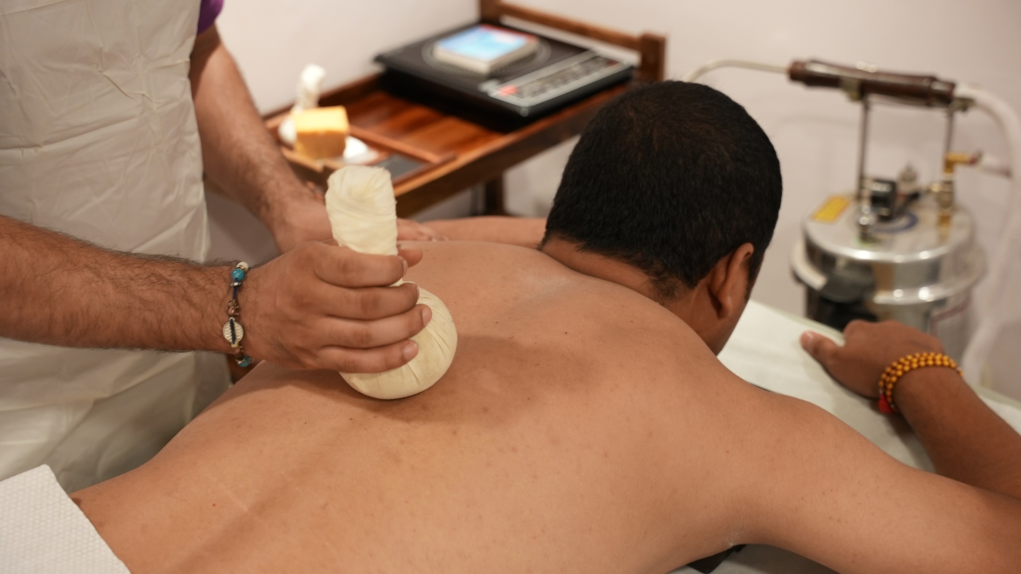 Why Heated Sand Massage Offers a Unique Wellness Experience
